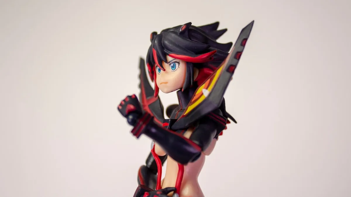 black haired girl in black and red suit anime character