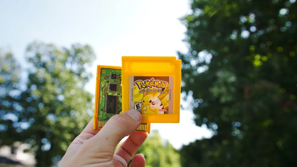 a person is holding a small yellow object