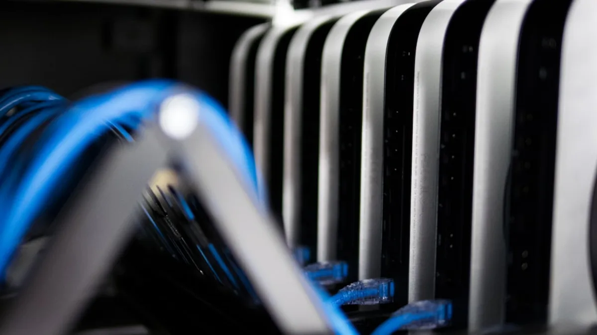 a close up of a bunch of wires in a rack