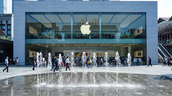 people walking on white floor tiles