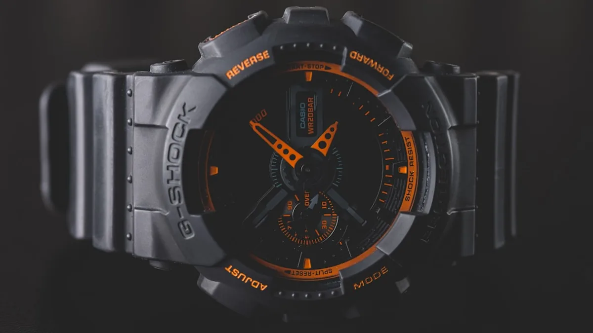 round black and orange Casio G-Shock analog watch