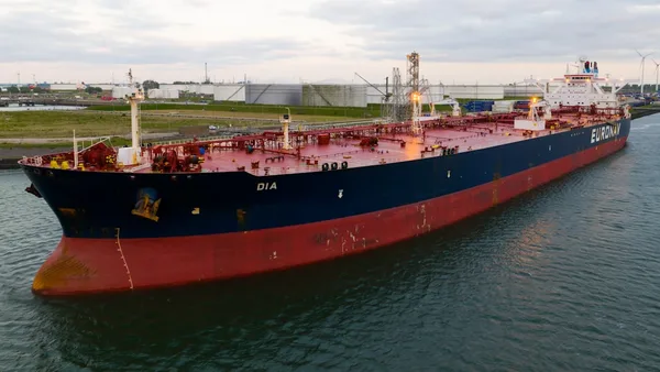 a large boat floating on top of a body of water