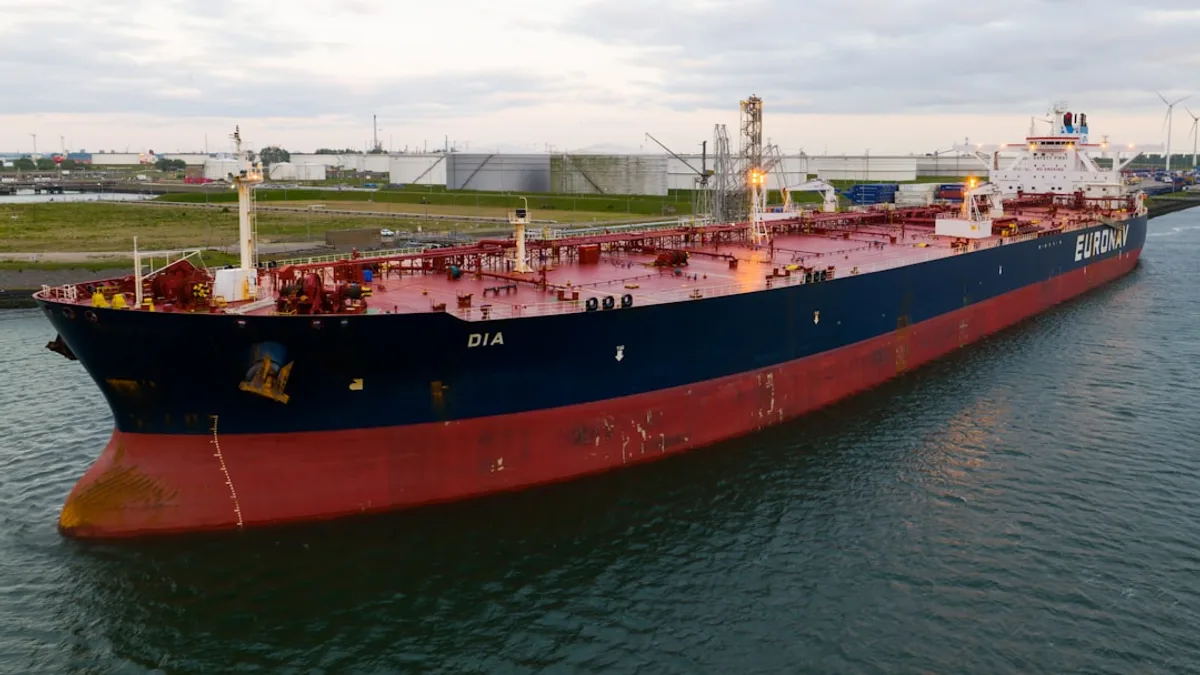 a large boat floating on top of a body of water