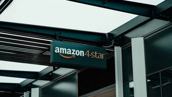 a sign hanging from the side of a building