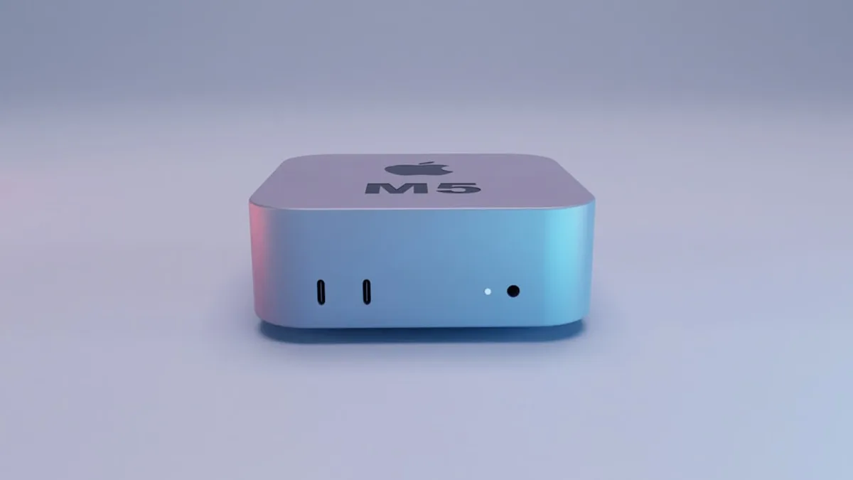 Silver apple mac mini computer on white surface