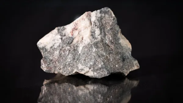 brown and gray stone fragment