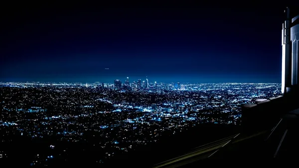 a view of a city at night from a window