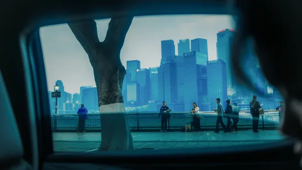 View of city skyline through car window