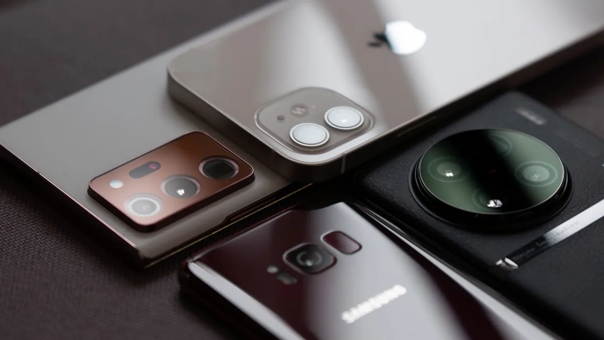a group of cell phones sitting on top of a table