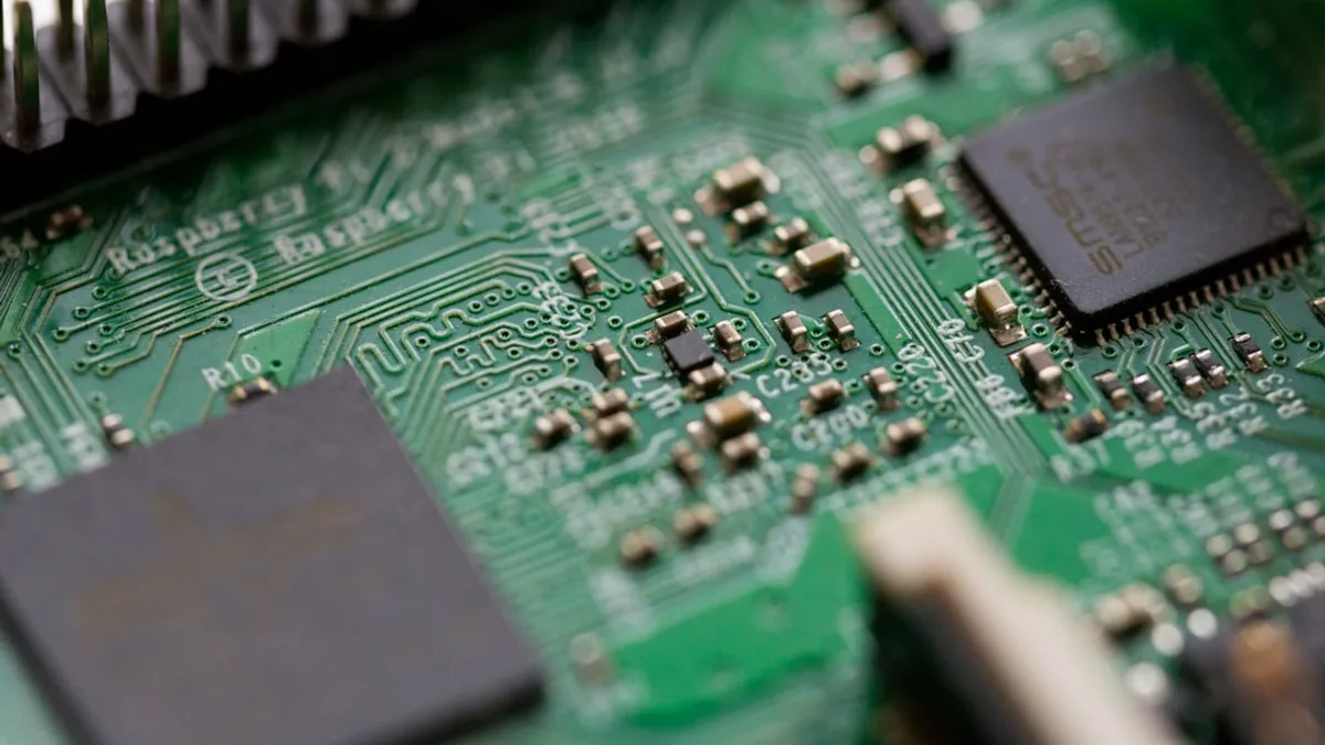 tilt-shift photography of green computer motherboard