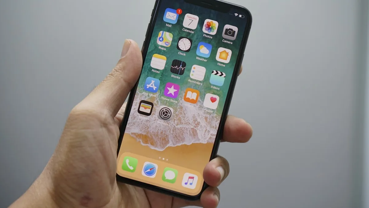 person holding space gray iPhone 7