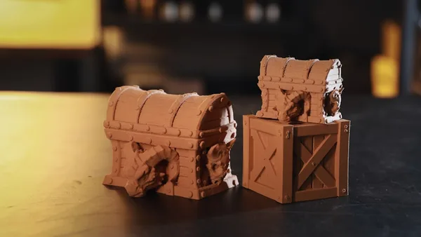 A close up of two pieces of clay on a table