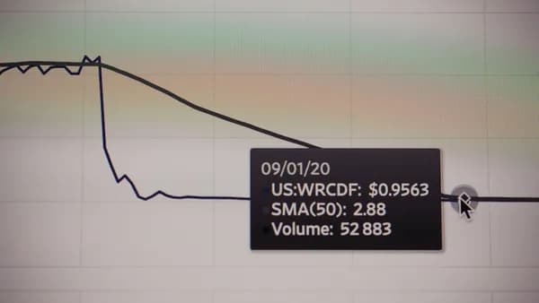 a black sign with a price tag on it