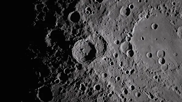 Close-up view of the moon's cratered surface