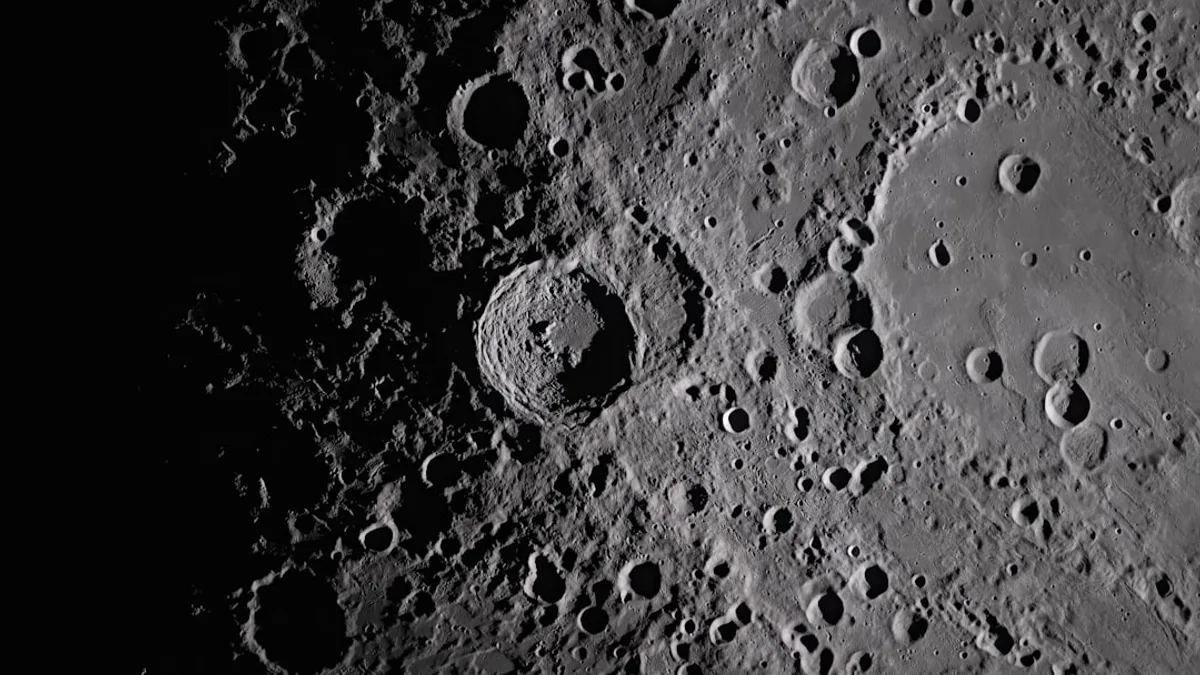 Close-up view of the moon's cratered surface