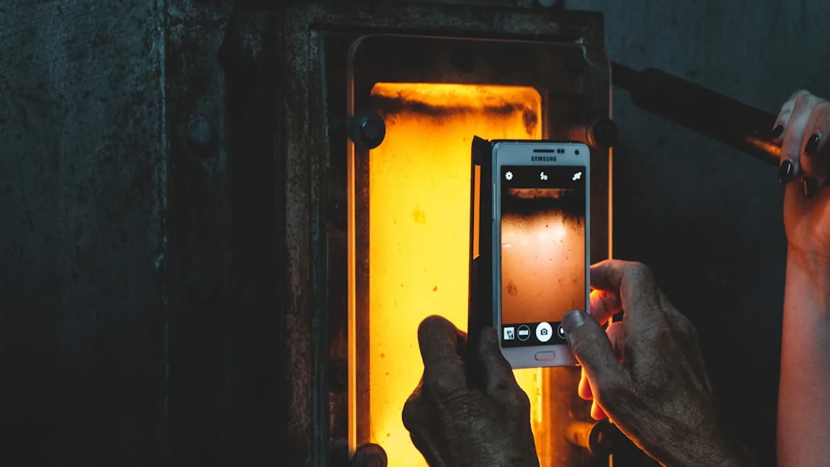person taking picture with white smartphone