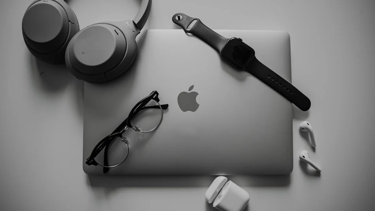 a black and white photo of a microphone and headphones
