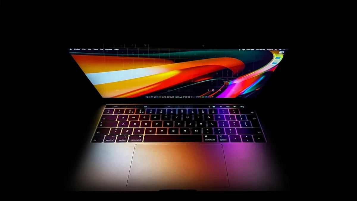 macbook pro turned on displaying red blue and yellow lights
