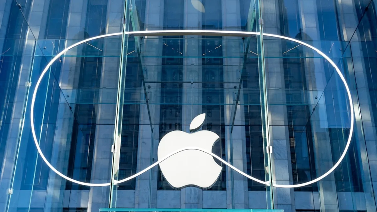 an apple logo on the side of a building