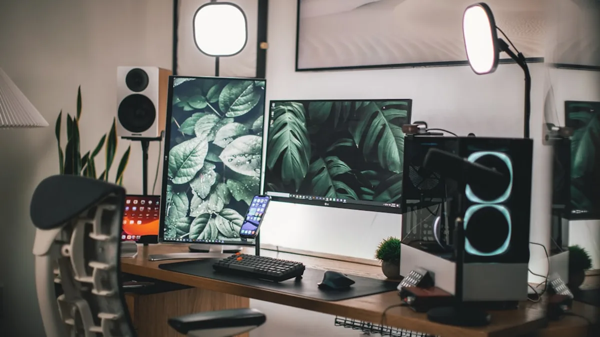 black flat screen computer monitor on white wooden desk