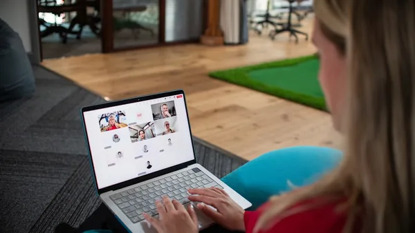 Woman on laptop in video conference call