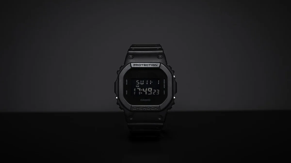 black casio digital watch at 11 00