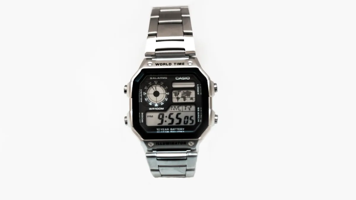 black and silver-colored Casio digital watch with link bracelet
