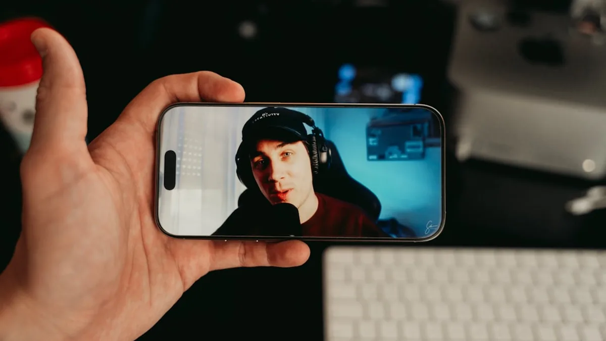 Person watching a live stream on their phone.