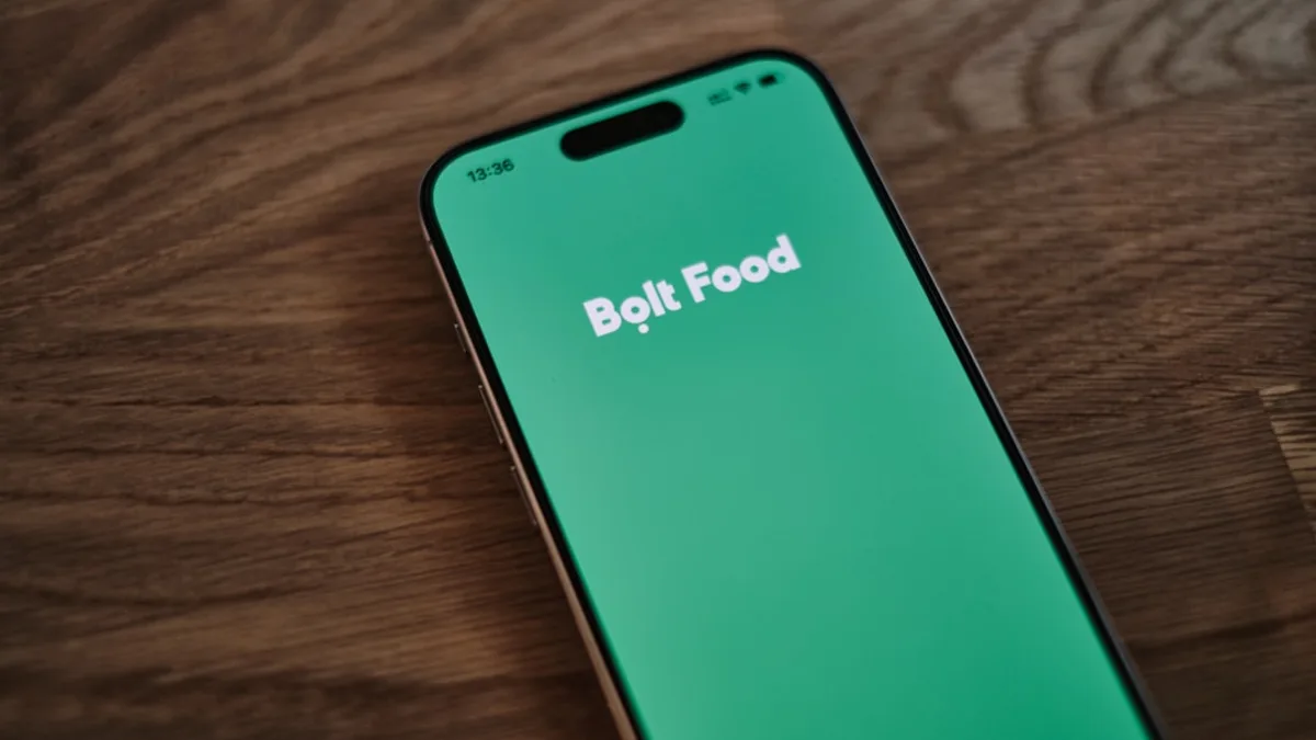 A close up of a cell phone on a table