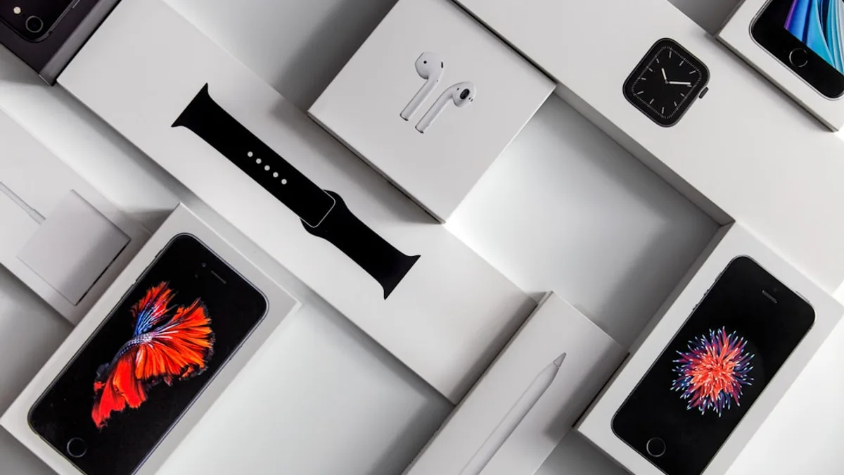 silver iphone 6 on white table