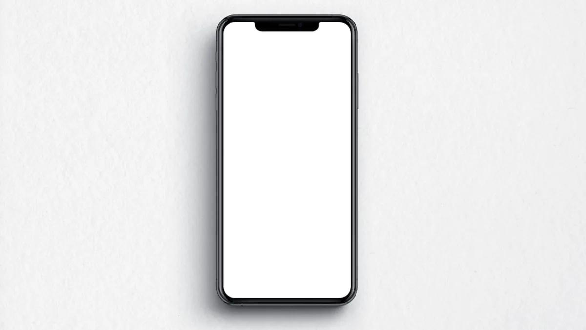 black android smartphone on white textile