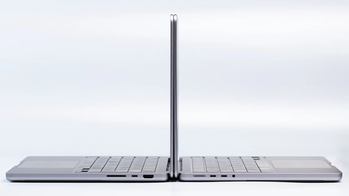 a silver laptop with a black keyboard