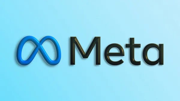 a blue and black logo with the word meta