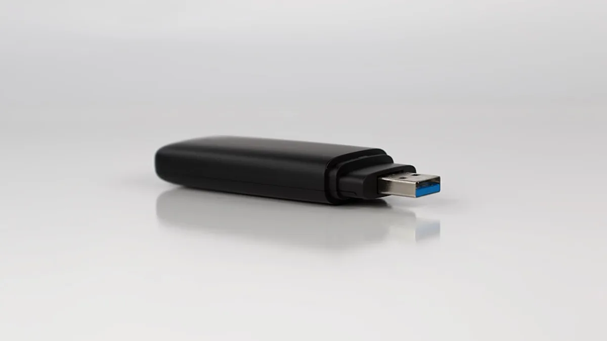 a close up of a usb device on a white surface