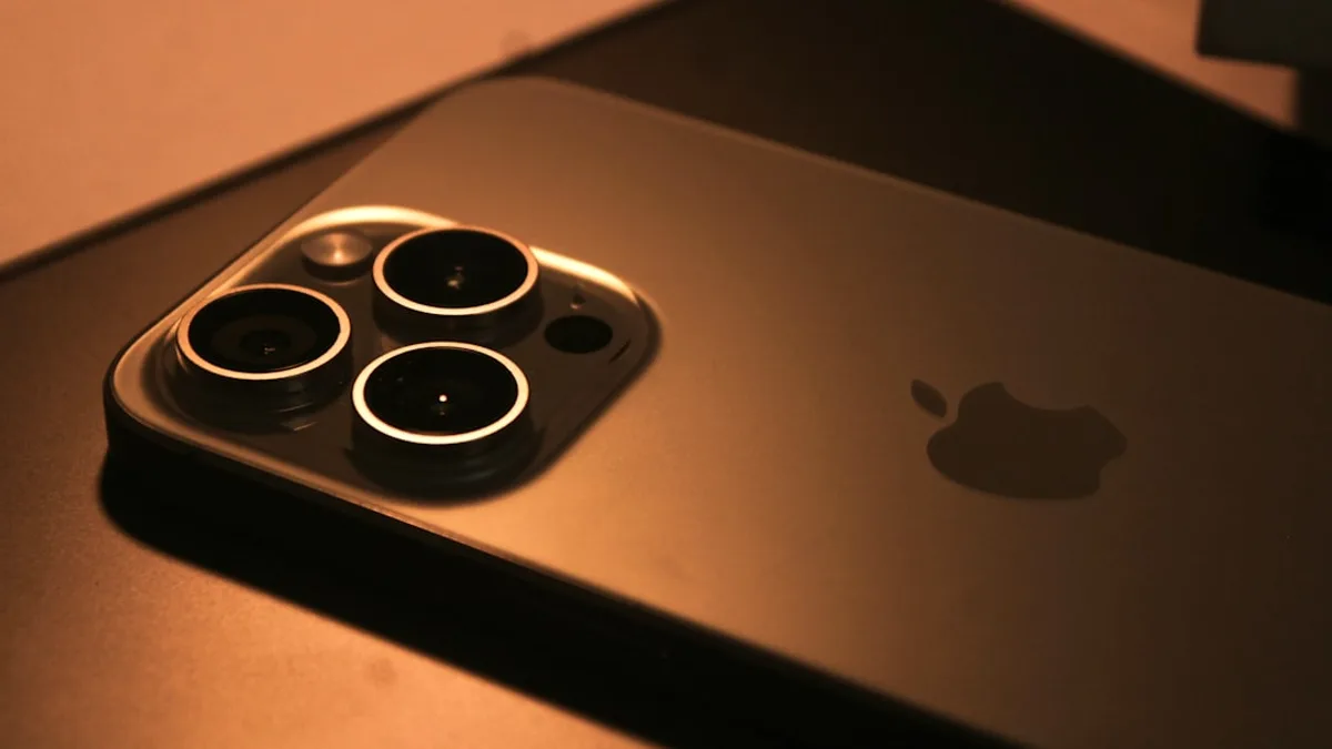 a close up of a cell phone on a table