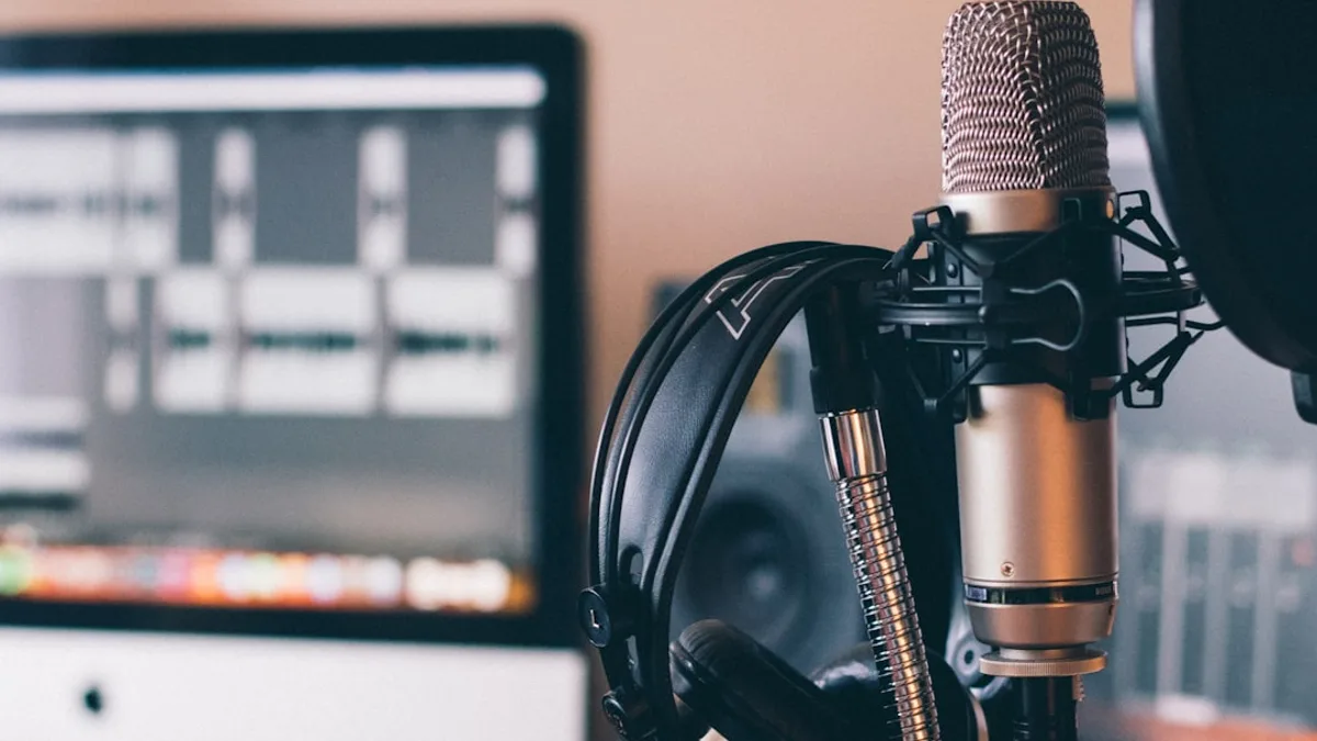 black and silver headphones on black and silver microphone