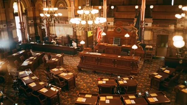 a view of a large room with a lot of desks