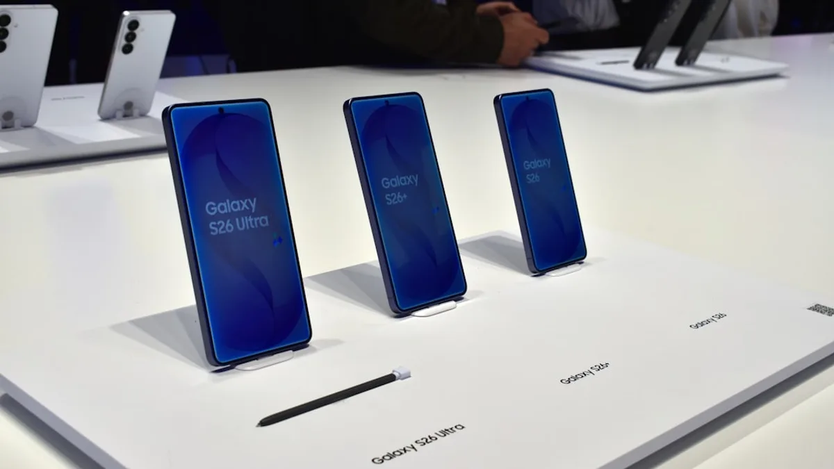 Three samsung galaxy smartphones displayed on a white surface.