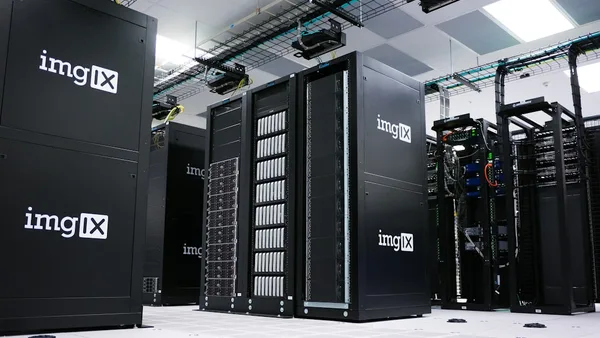 img IX mining rig inside white and gray room