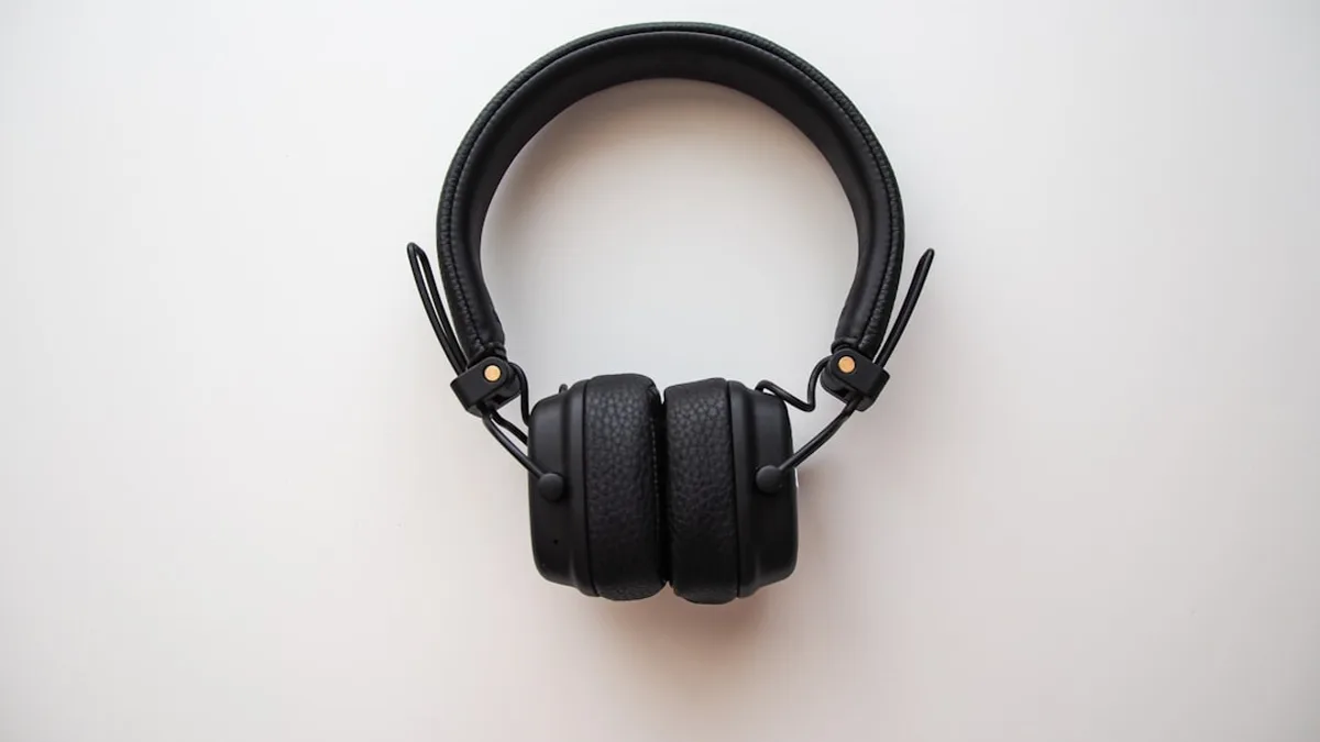 black headphones on white table
