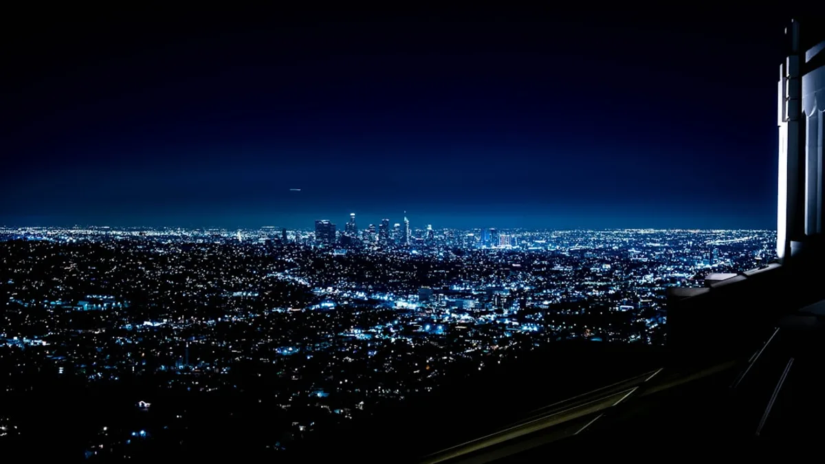 a view of a city at night from a window