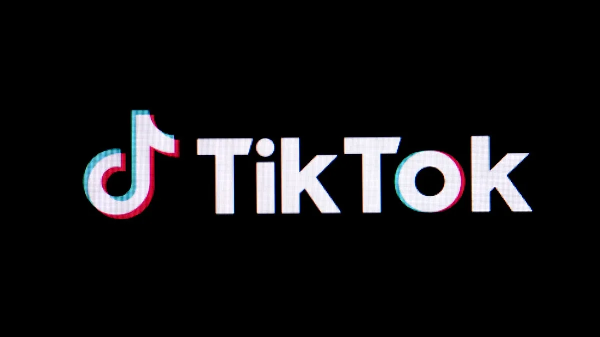 The tiktok logo on a black background