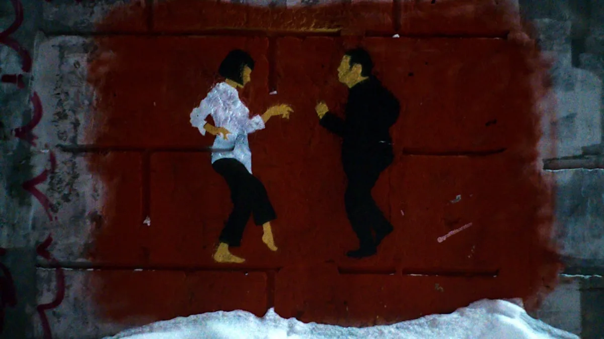 man in white jacket and black pants playing on snow