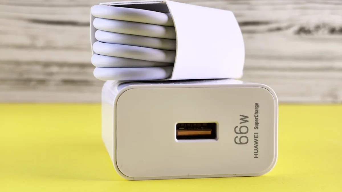 A close up of a cell phone charger on a table