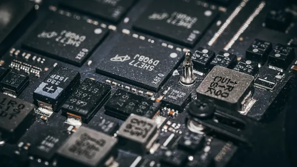 Close-up of a complex electronic circuit board with many components.