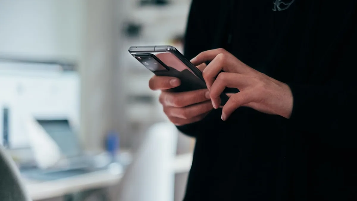 person holding black android smartphone