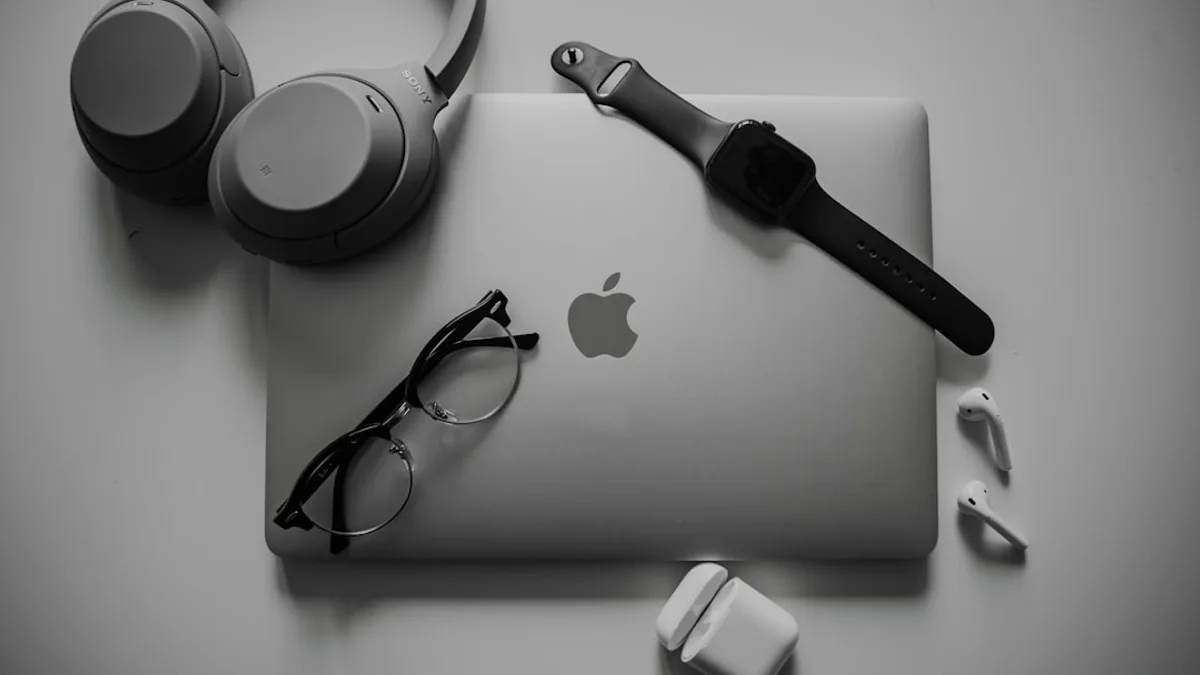 a black and white photo of a microphone and headphones