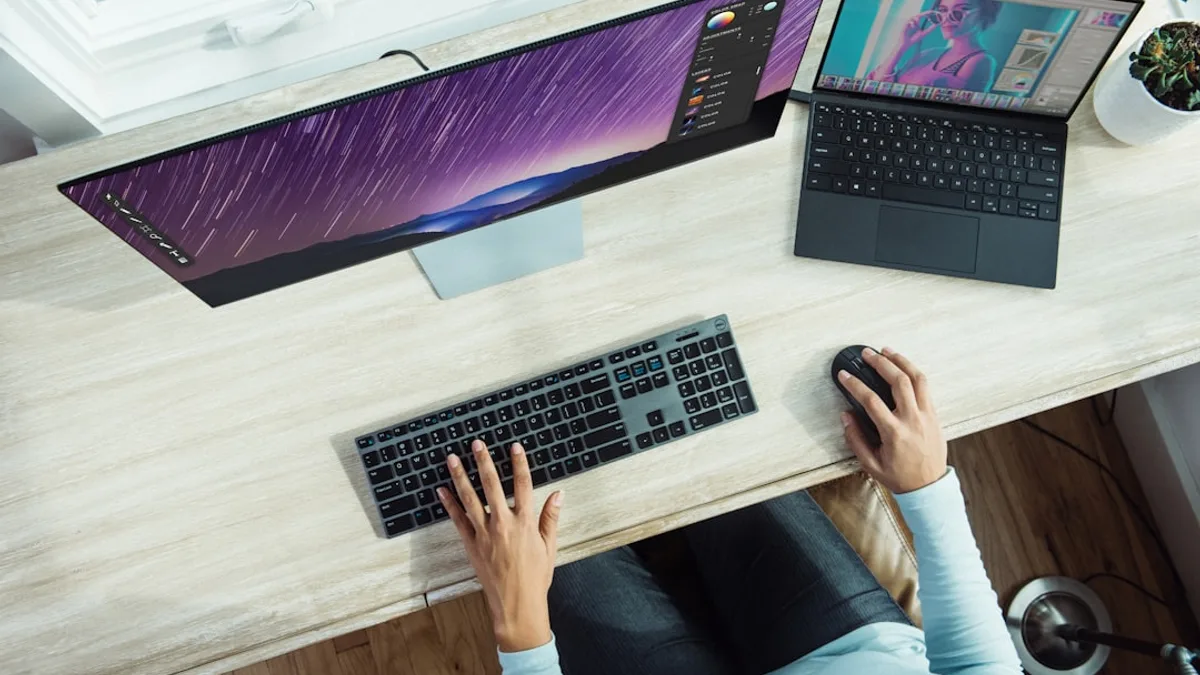 person using laptop on table