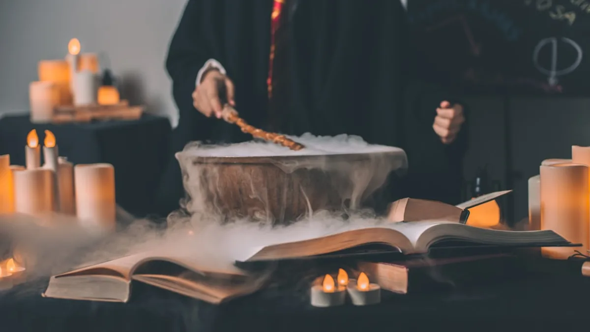 person holding wand on top of bowl