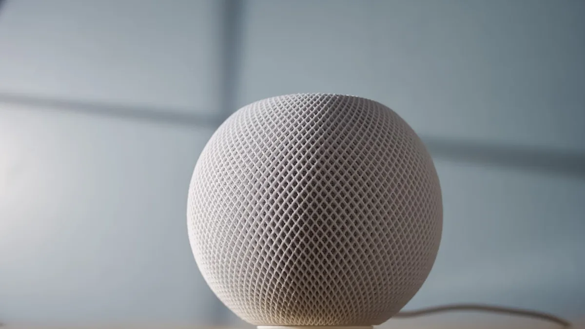 round gray ball on brown wooden table